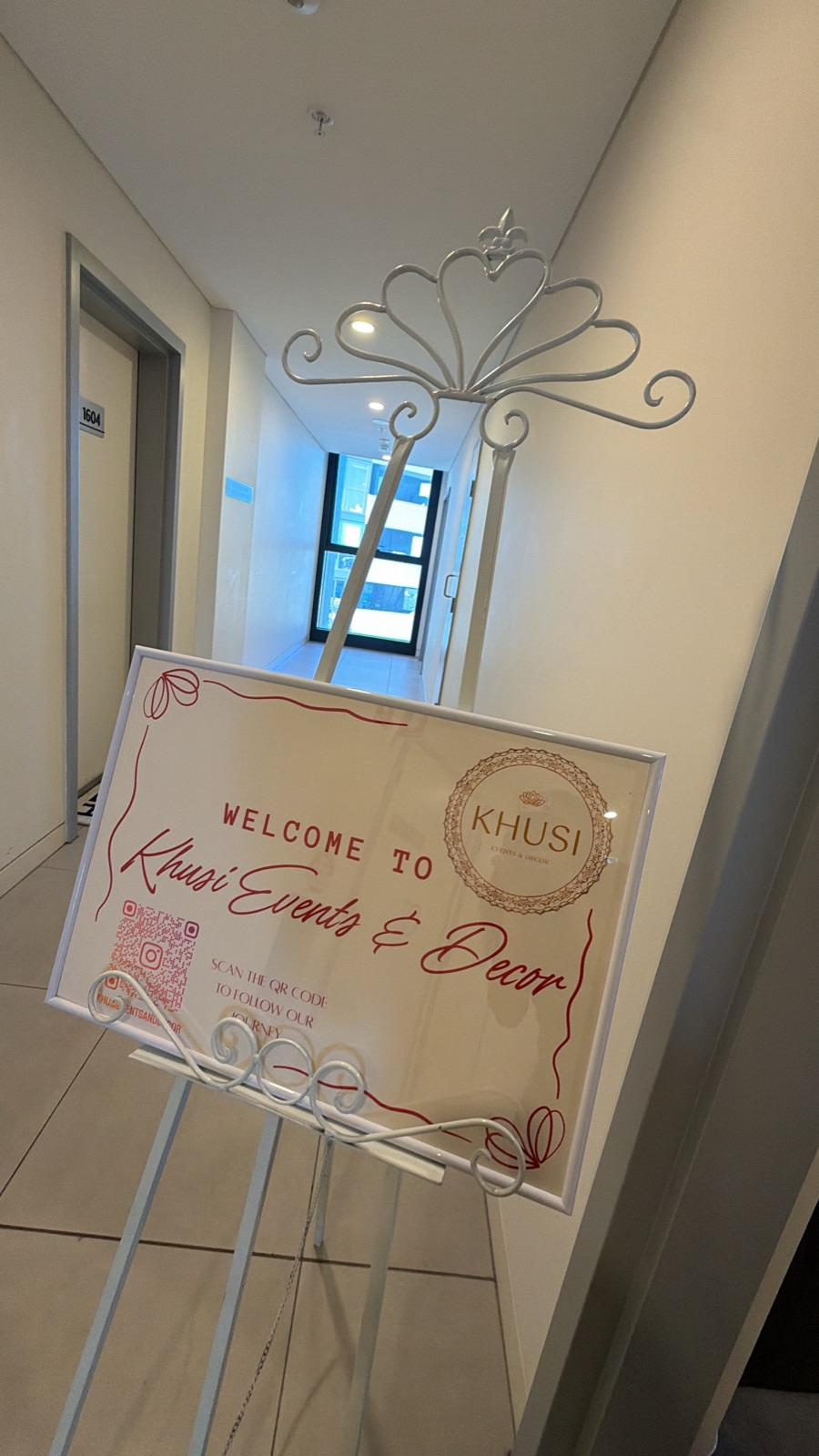 Khusi Events styled table setting with flowers and food display